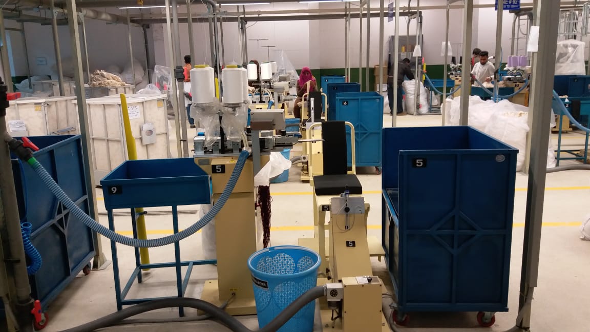 Toe closing and linking stations on the production floor